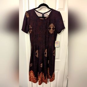 LuLaRoe Amelia with red/white design by lower hem